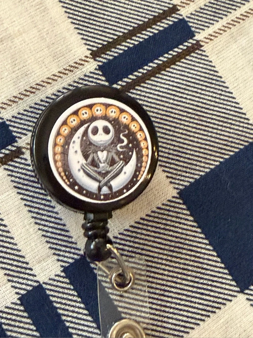 Black Badge Reel with White/Grey Jack Skellington Art